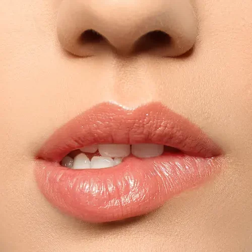 Clinique dentaire à Aix-en-Provence 2 - Clinique Dentaire Sextius beautiful-young-woman-biting-lip-on-grey-backgroun-2026-01-19-18-18-13-utc